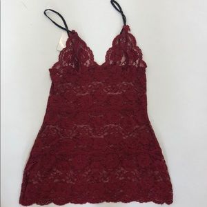 Cranberry hip length cami. Brand new